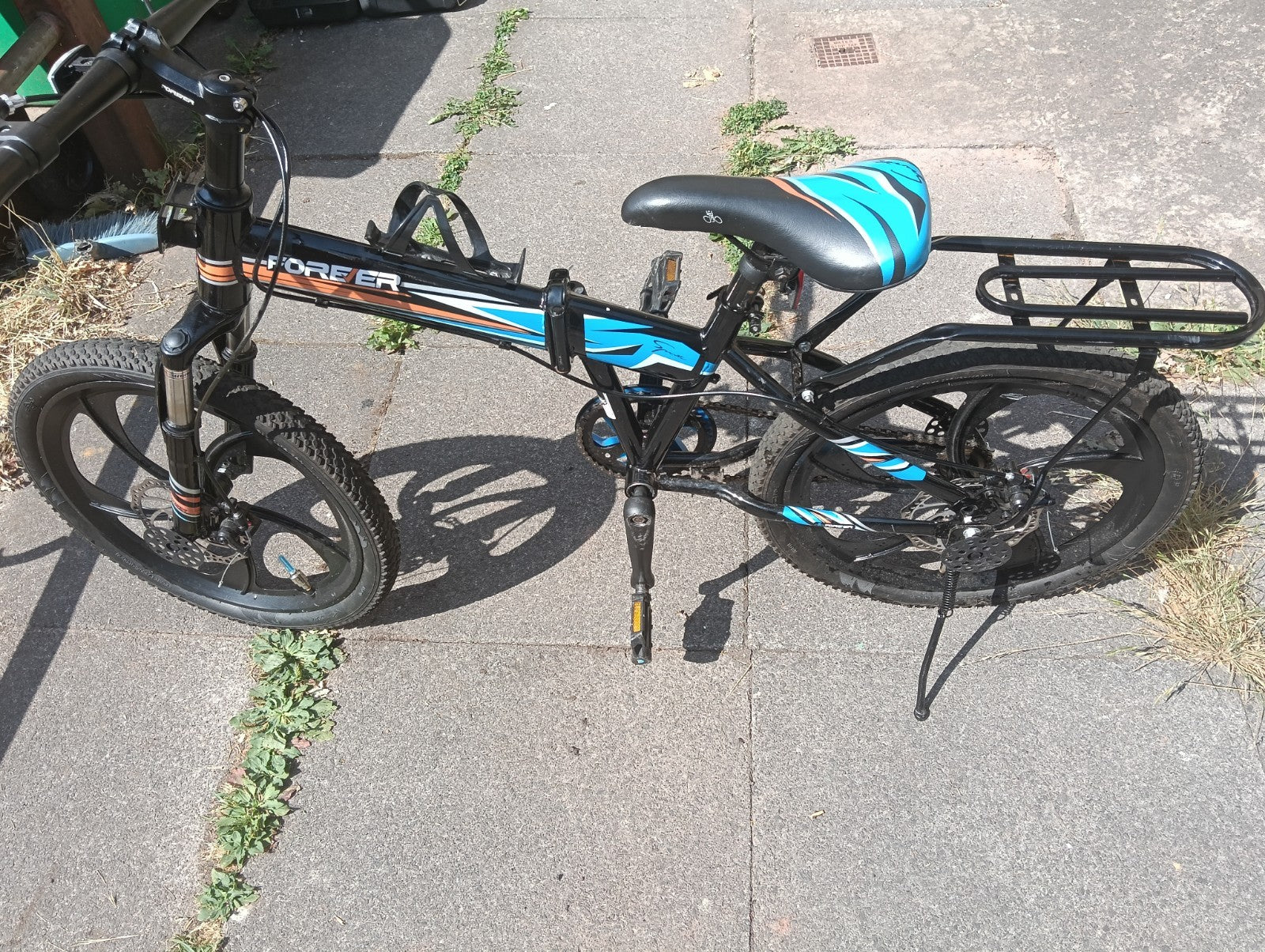 Forever 26in Unisex Kids Folding Bike Black/Blue Disc Brakes Mag Wheels Rack