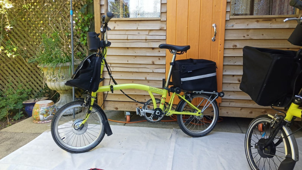 A Pair of Yellow Bromton Bikes with switch conversion. Excellent Condition