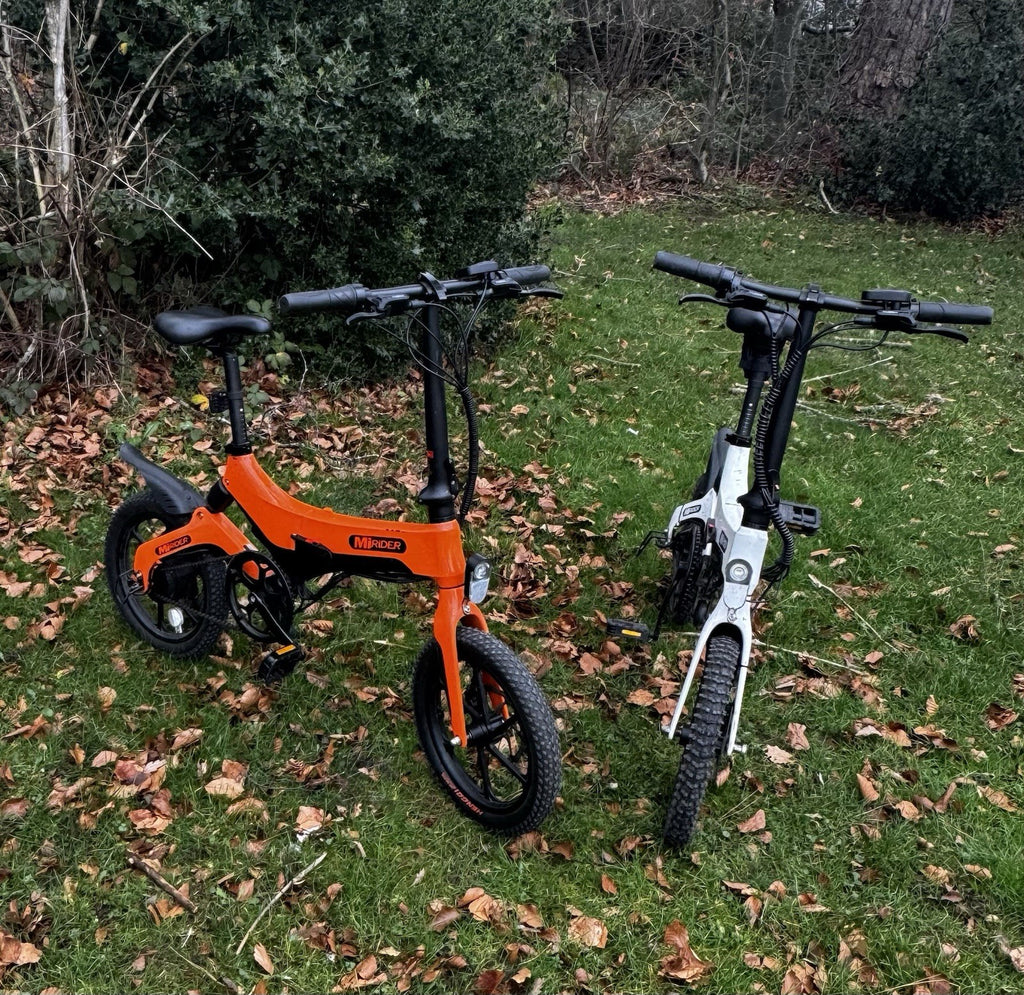 MiRider One Folding Electric Bikes Orange And White Pair.