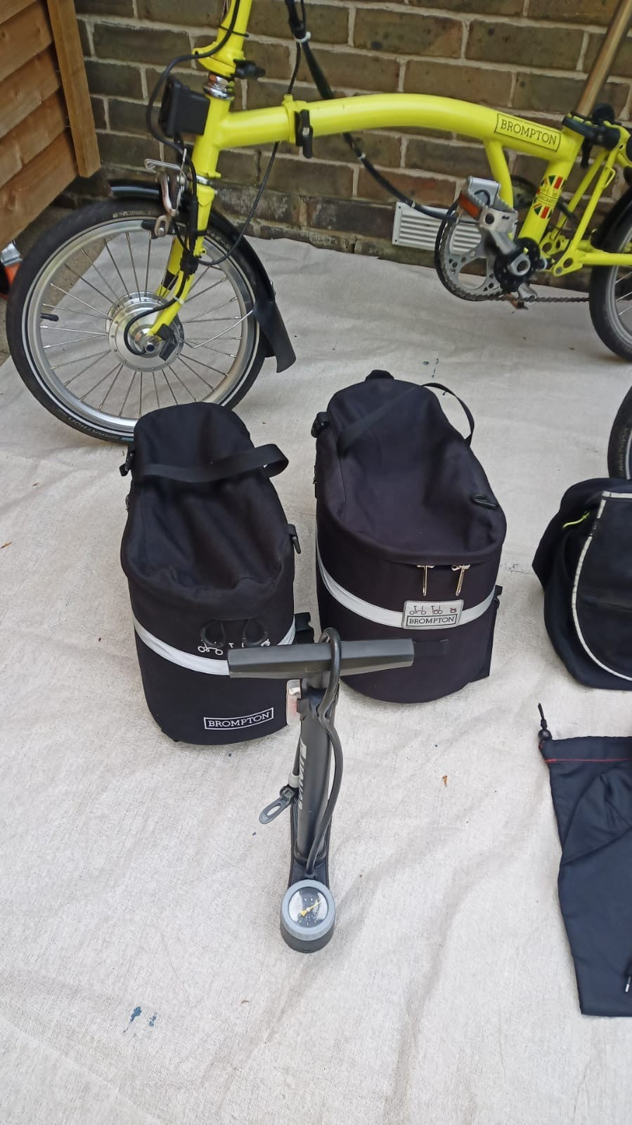 A Pair of Yellow Bromton Bikes In Excellent Condition with Conversion Kit