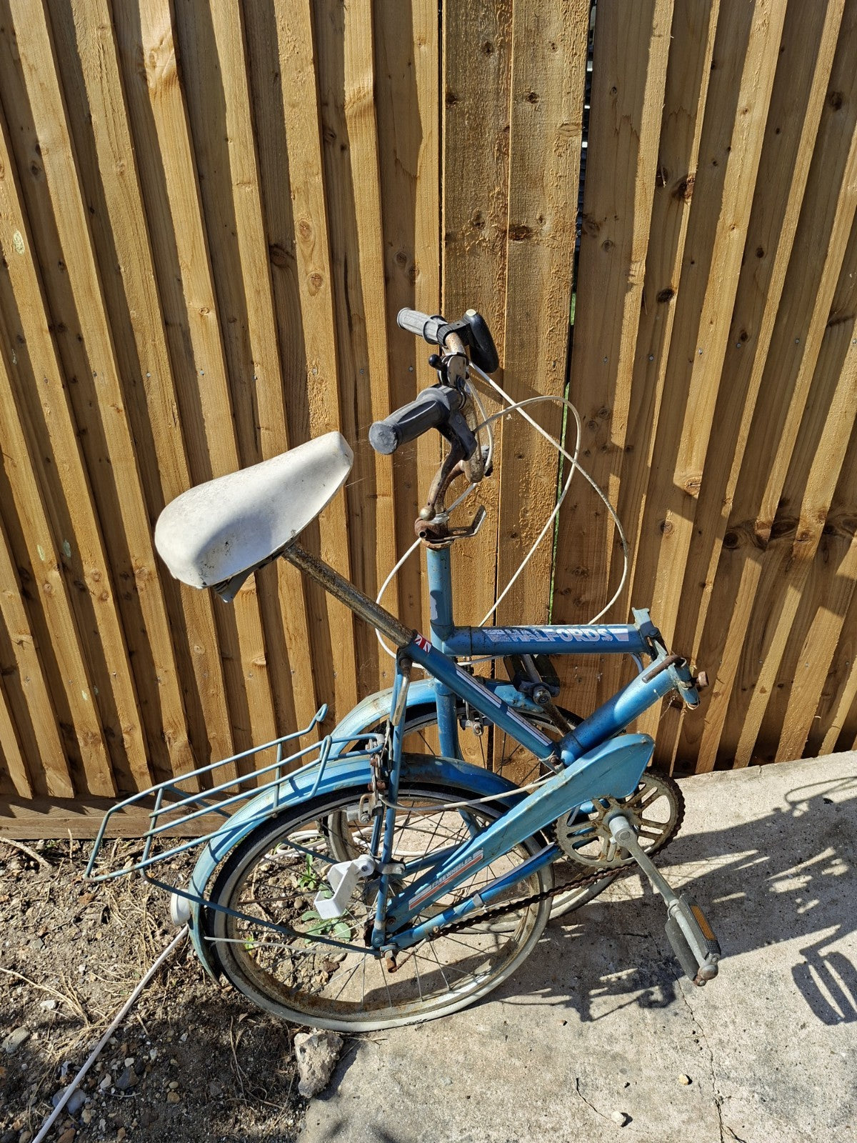 Halfords Blue Folding Bike Step-Through Frame with Rear Rack for Storage