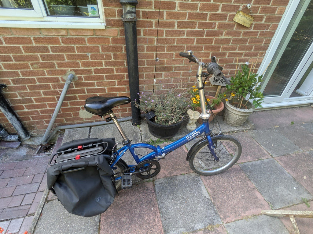 Apollo Tuck Folding Bike 20" Wheels, 6 speed, Blue, kickstand, LED lights, rack