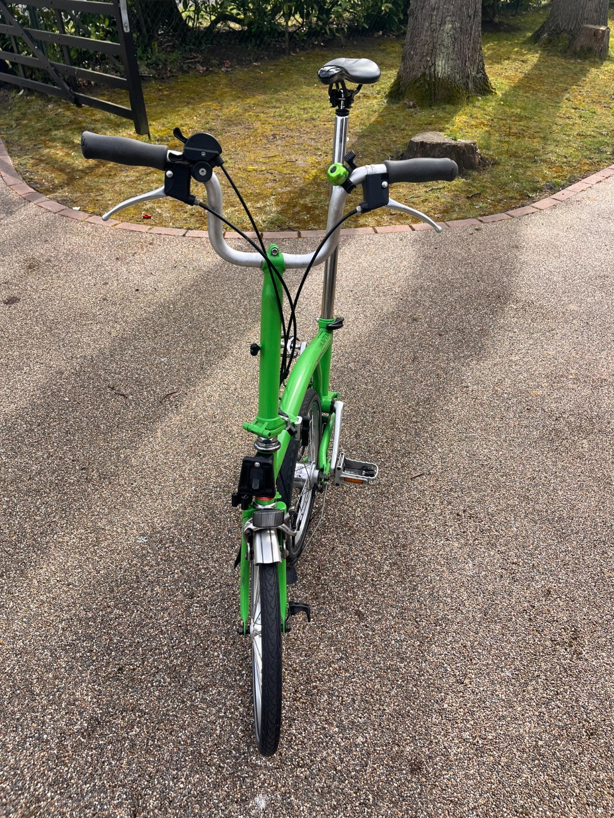Lime green Brompton folding bike 3 speed