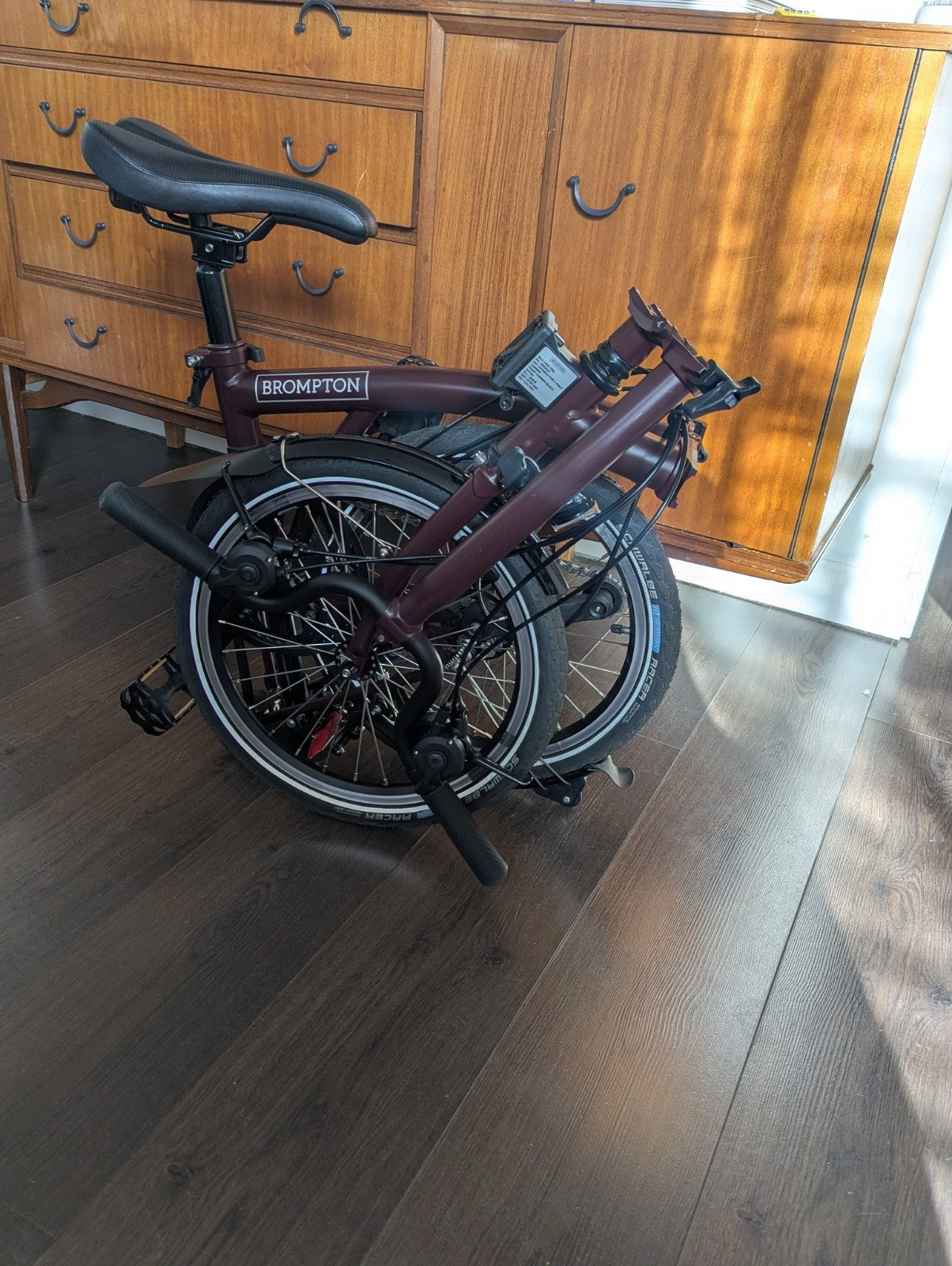 Brompton bike C-line 12-speed 2026 mid bar in Burgundy colour