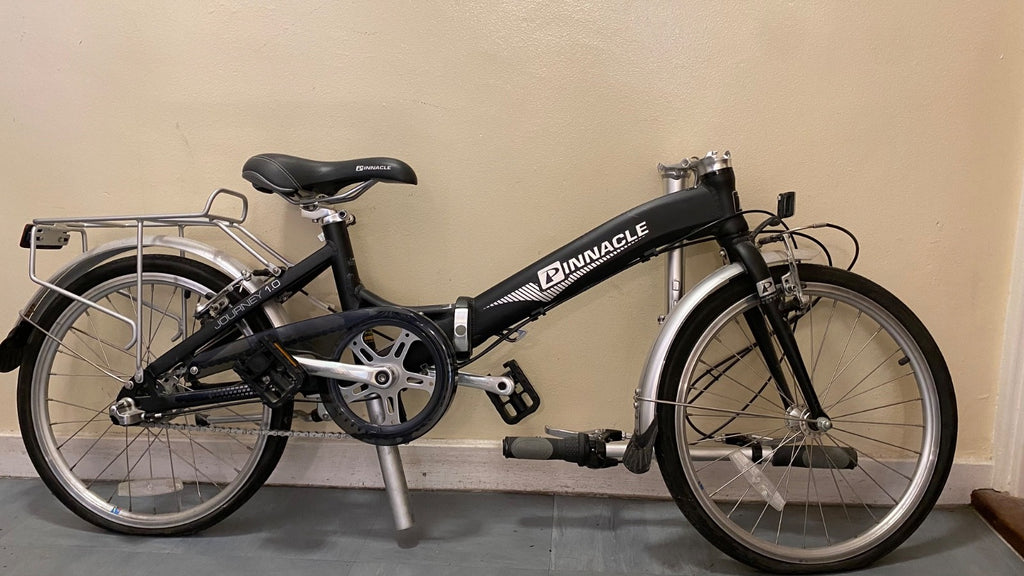 Pinnacle Journey 1.0 folding bike in matte black. Shimano Nexus 3-speed.