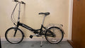 Pinnacle Journey 1.0 folding bike in matte black. Shimano Nexus 3-speed.