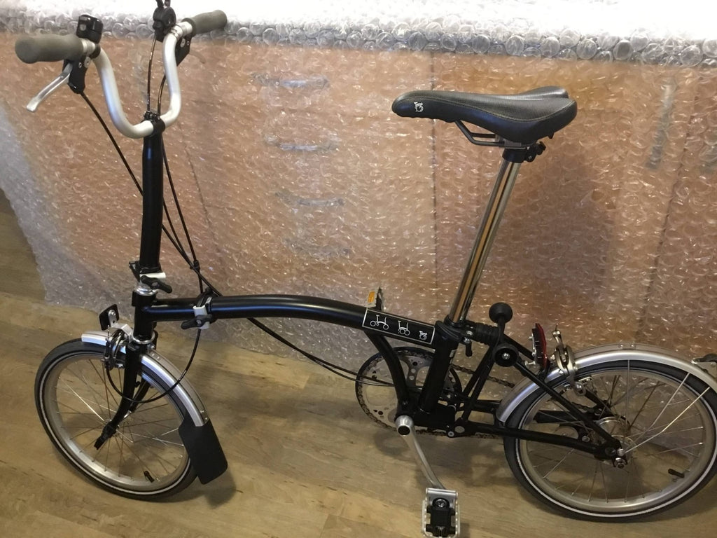 Brompton M3L 12 black folding bike.