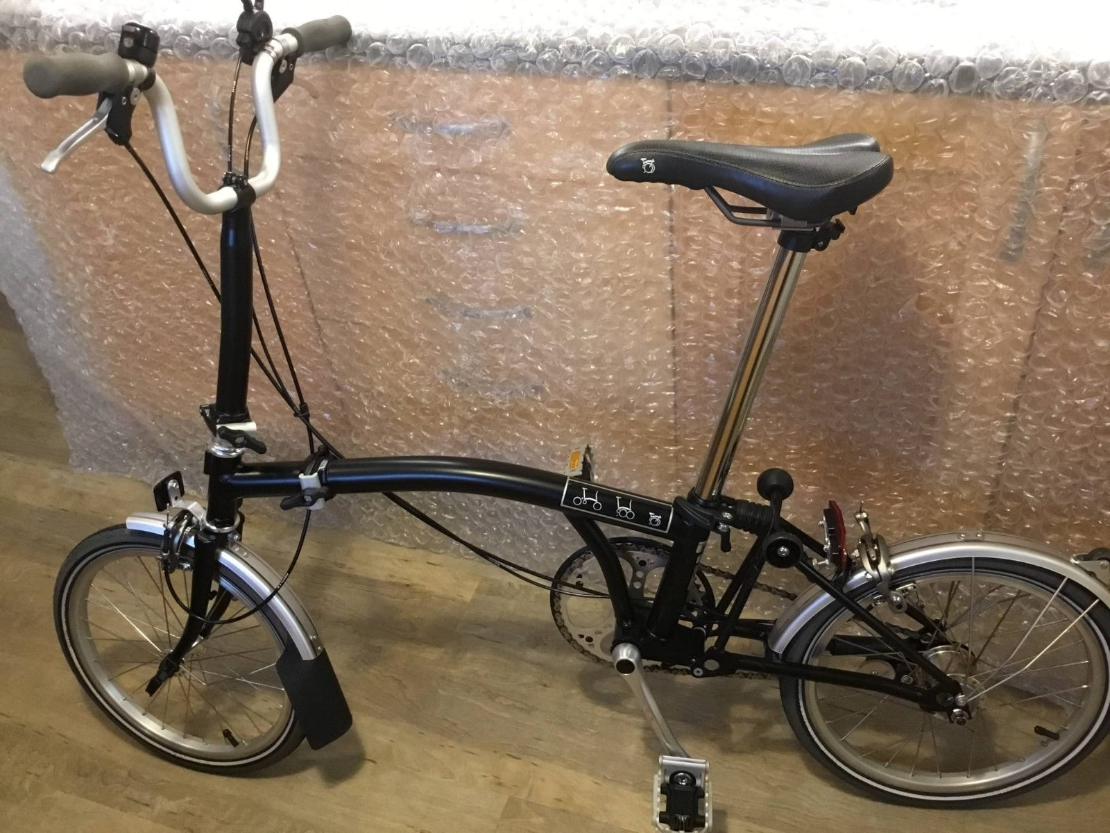 Brompton M3L 12 black folding bike.