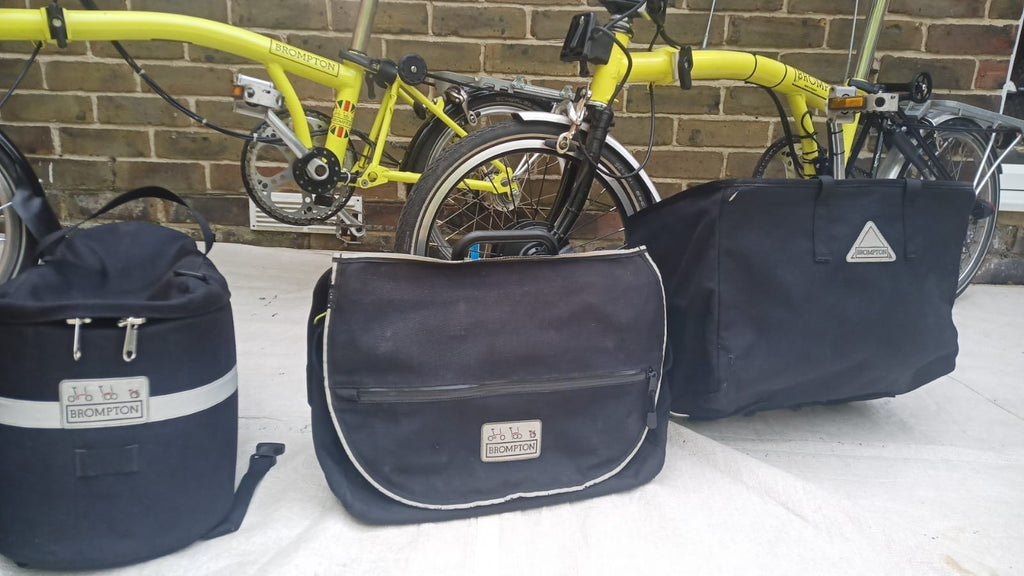 A Pair of Yellow Bromton Bikes In Excellent Condition with Conversion Kit