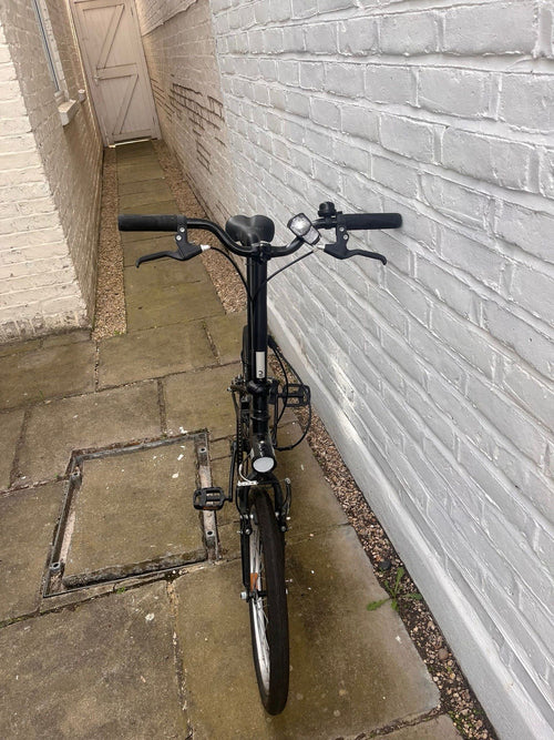 Black BTWIN folding bike