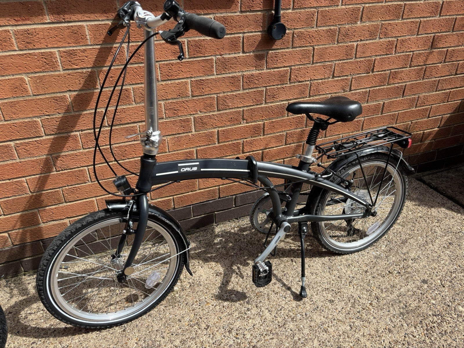 A Pair of Orus Folding Bikes with 20 Wheels one never used one used once
