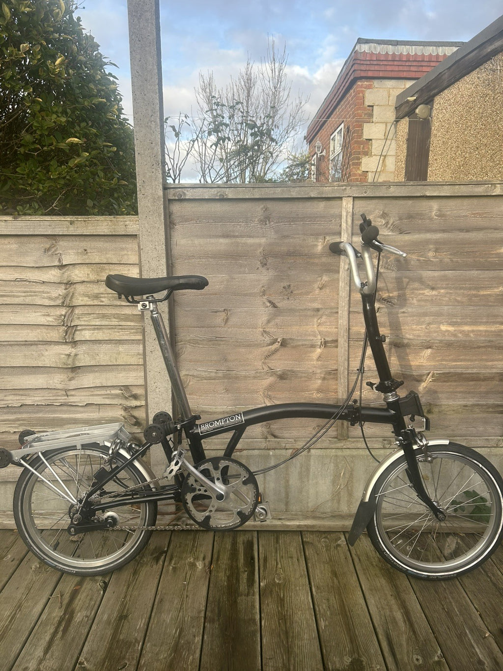 Brompton H3L Black with a rack