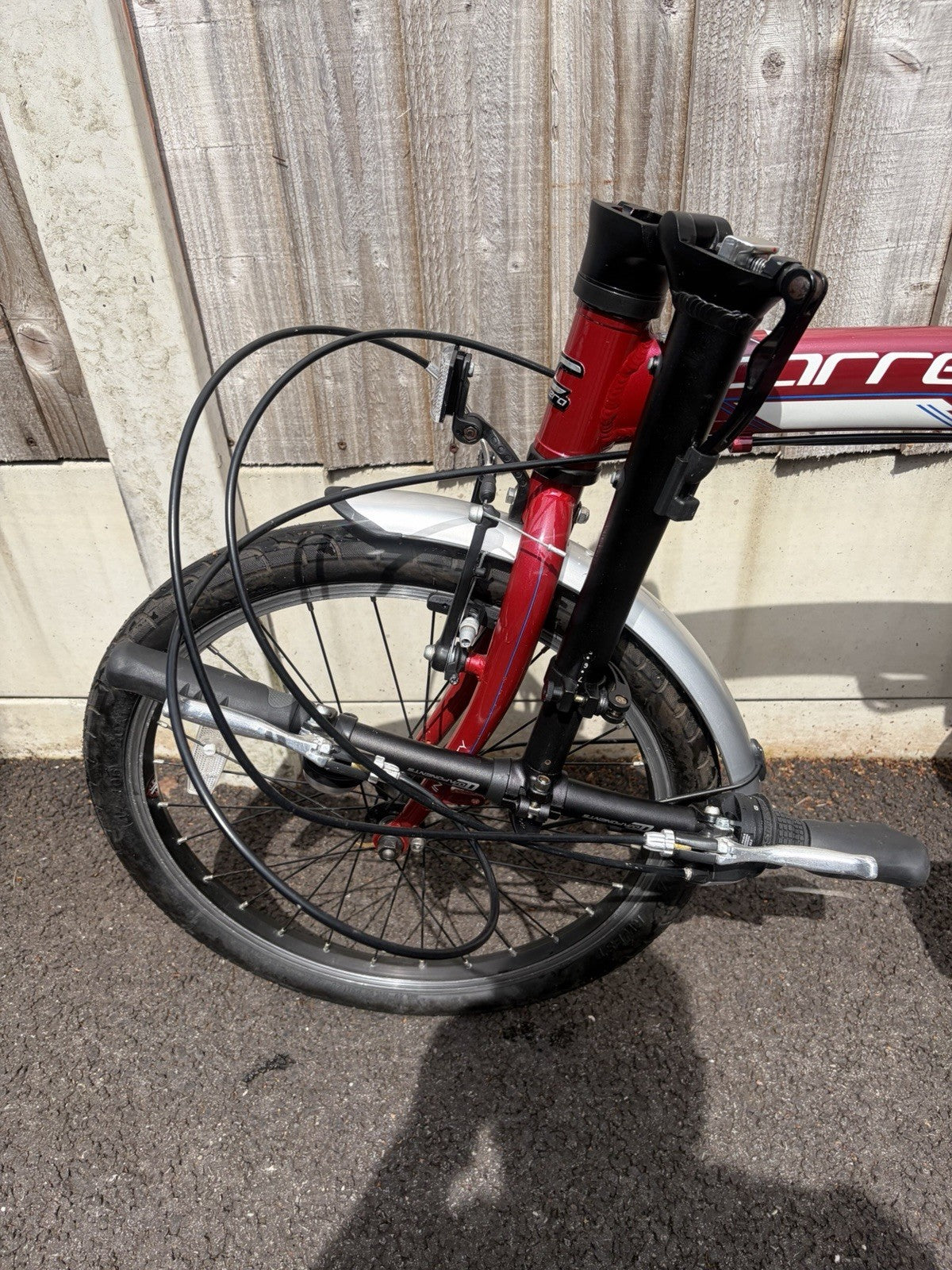 Carerra Intercity Folding Bike In Red.