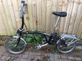 Brompton Black 3 speed folding bike with rear rack and P type handle bars
