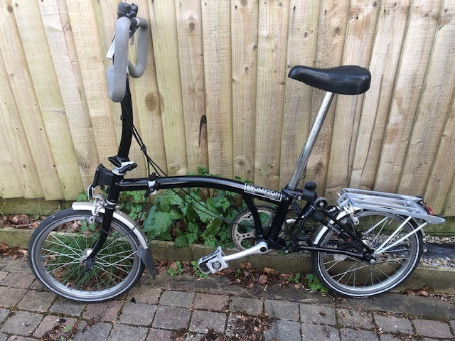Brompton Black 3 speed folding bike with rear rack and P type handle bars