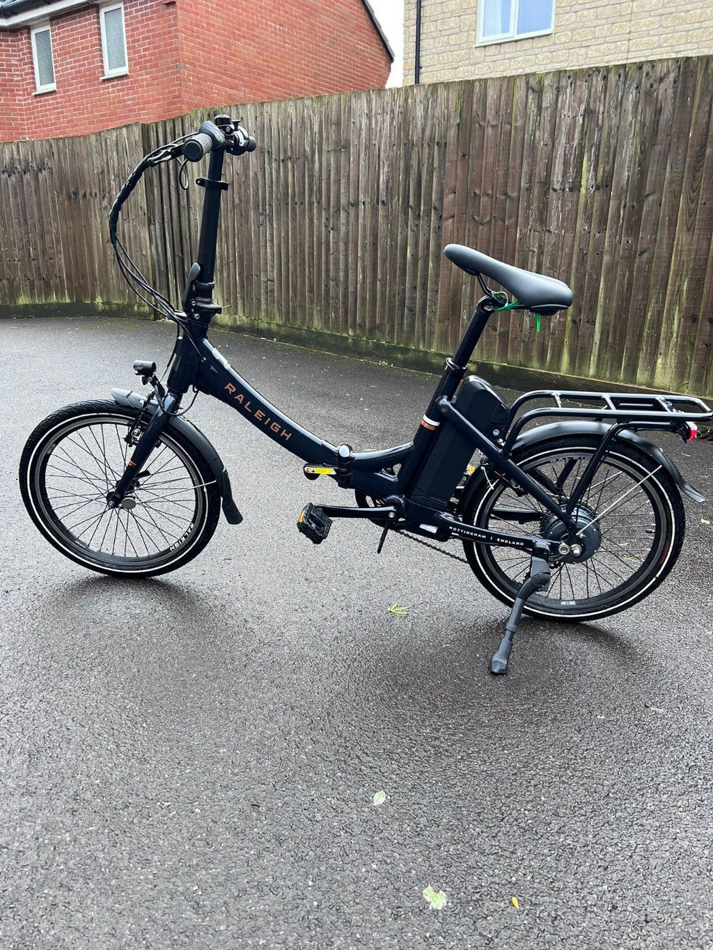 Raleigh Stow-E-Way Folding Bike In Dark Blue Designed to be packed away