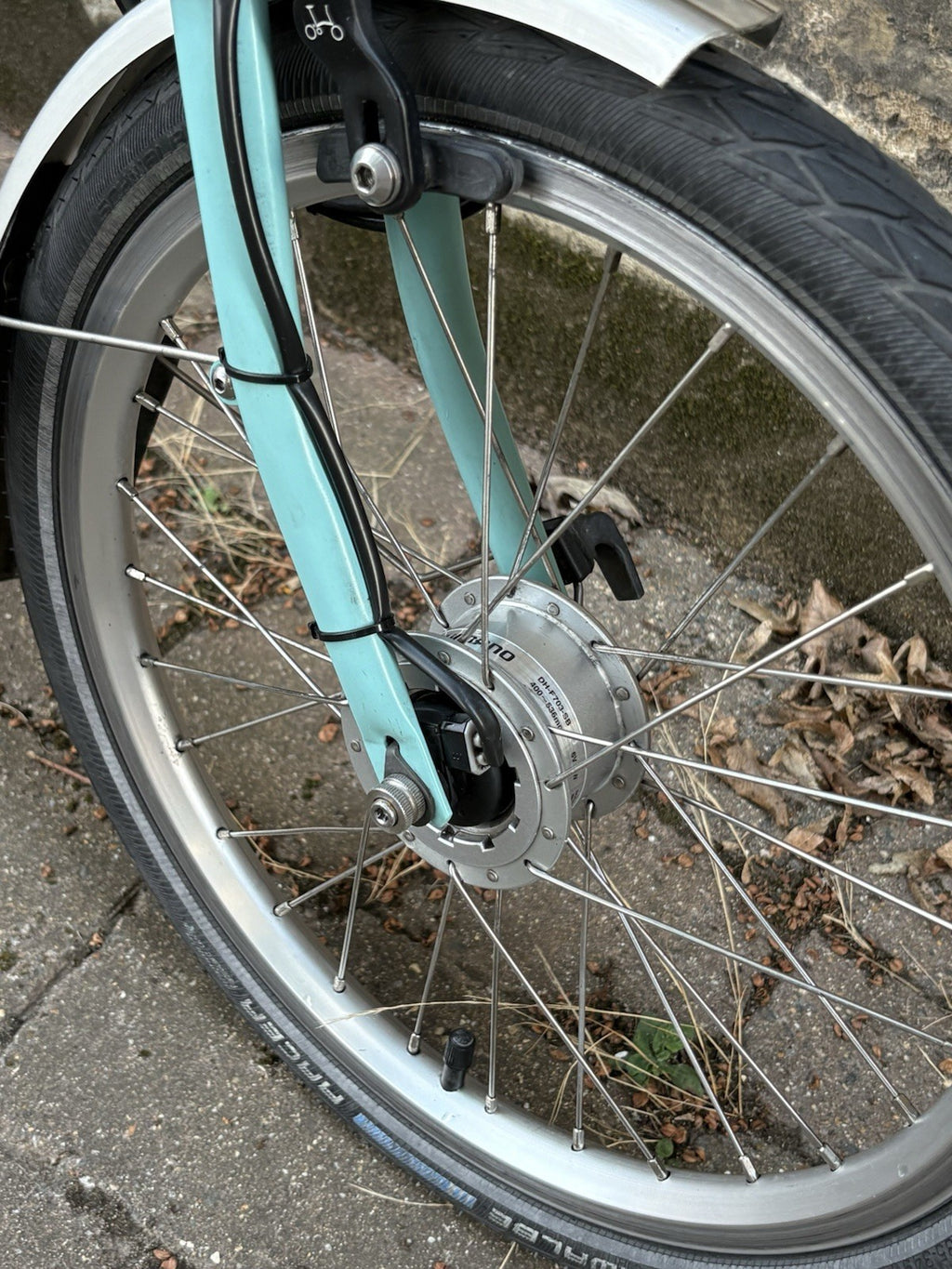 Brompton M6R Folding Bike - Celeste w/ Mudguards, Rack And Dynamo Light Set
