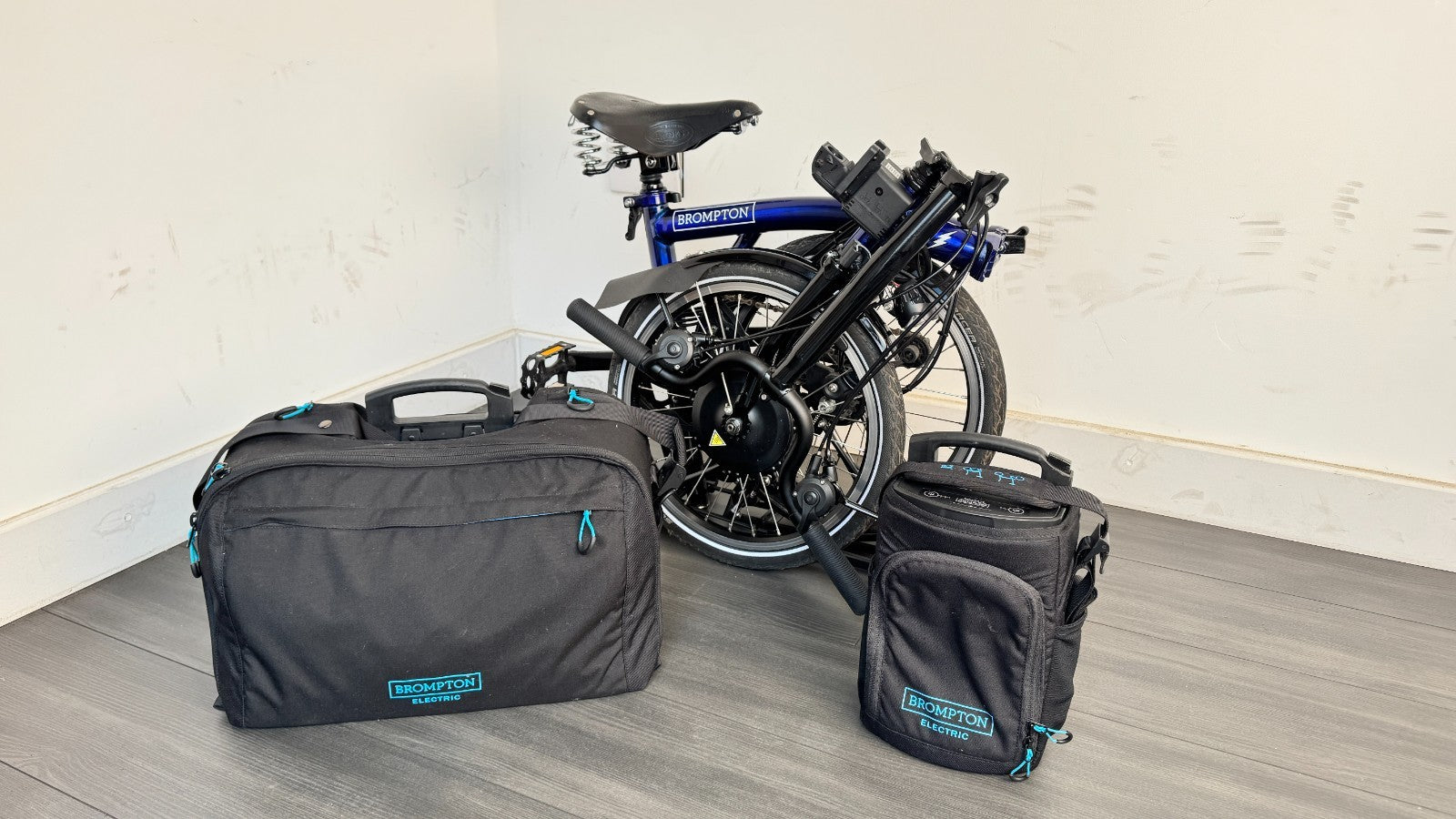 Brompton C-Line Electric 6 Speed Bolt Blue Lacquer Pannier bag Brooks saddle