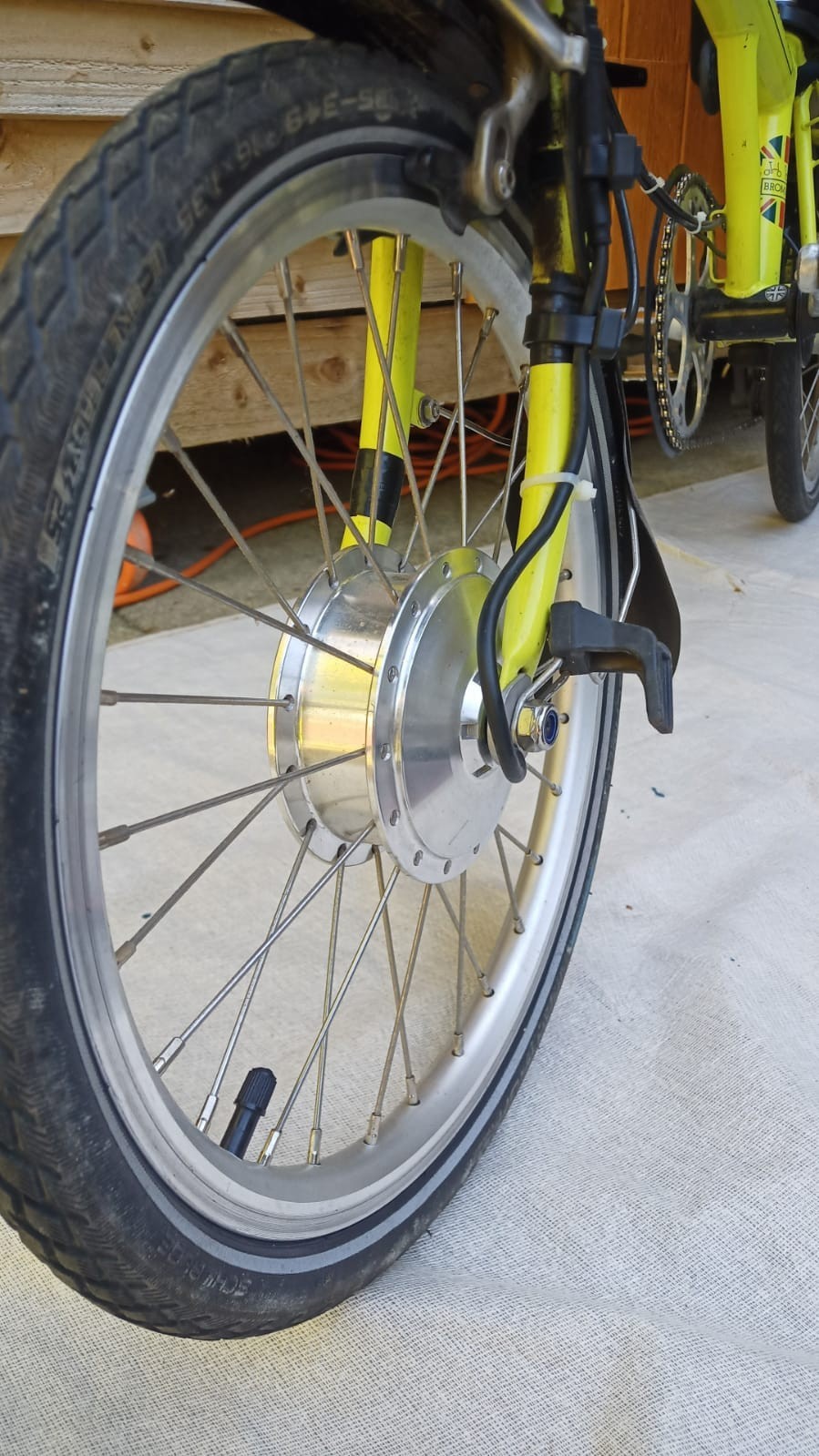 A Pair of Yellow Bromton Bikes In Excellent Condition with Conversion Kit