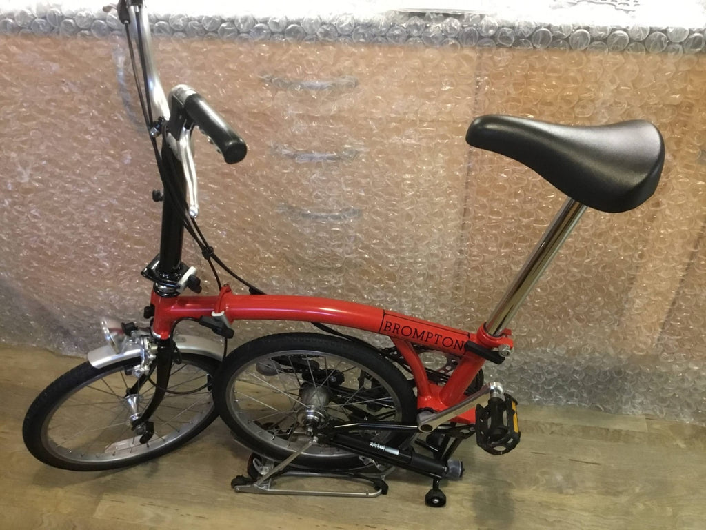 Brompton Folding Bike Red with Reflectors and Mudguards.