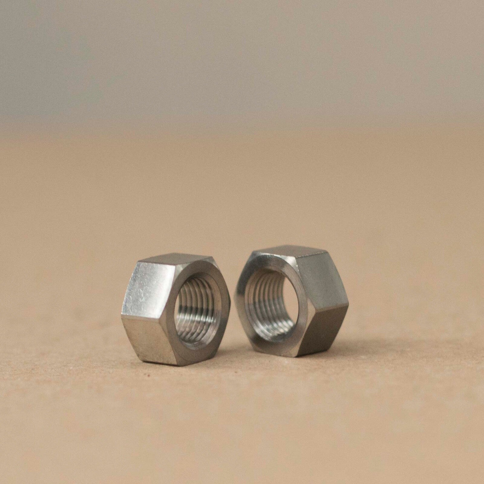 Brompton 3/6/12 Speed Rear Wheel Titanium Nut Pair