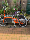 brompton folding bike 6 speed Orange .Item in good working order.