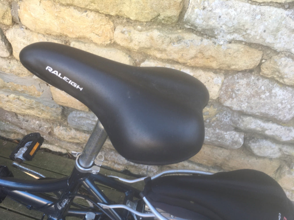 Raleigh Folding Bike plus cover.  Good condition