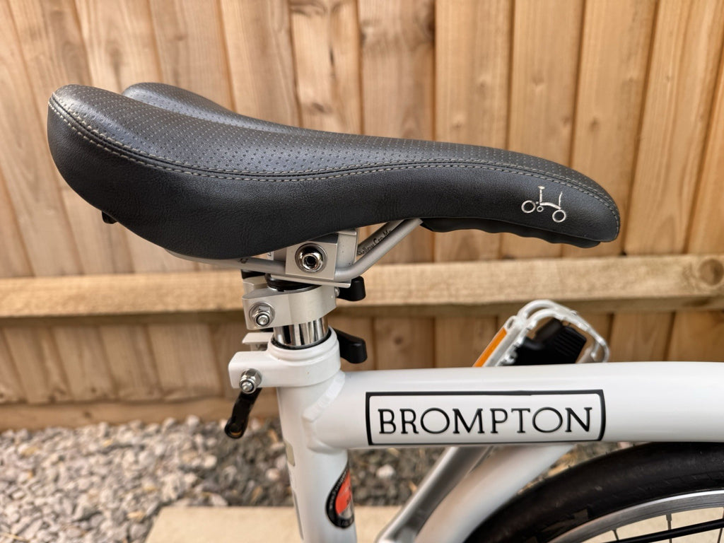 Brompton Titanium / Steel Single Speed 8.3kg with ancillaries