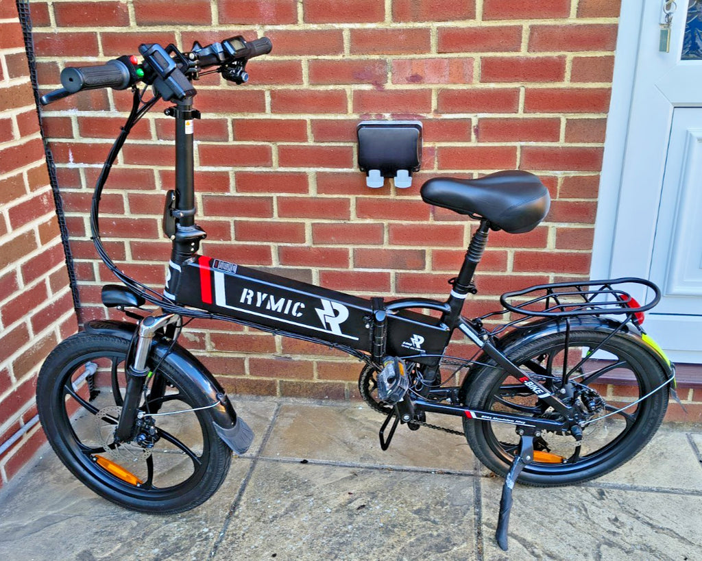 Rymic 20LVXD30 20inch Folding City Bike, front suspension, lights, pannier rack