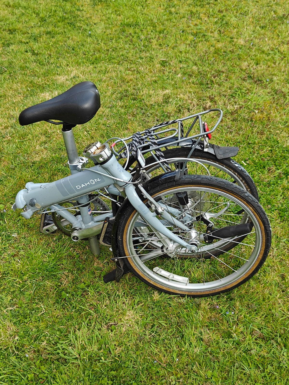 2 x Dahon Vitesse folding bikes, plus 2 x Dahon bike bags.