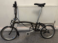 Brompton C Line Explore 2024 Folding Bike - Low Handlebar - Gloss Black Lacquer