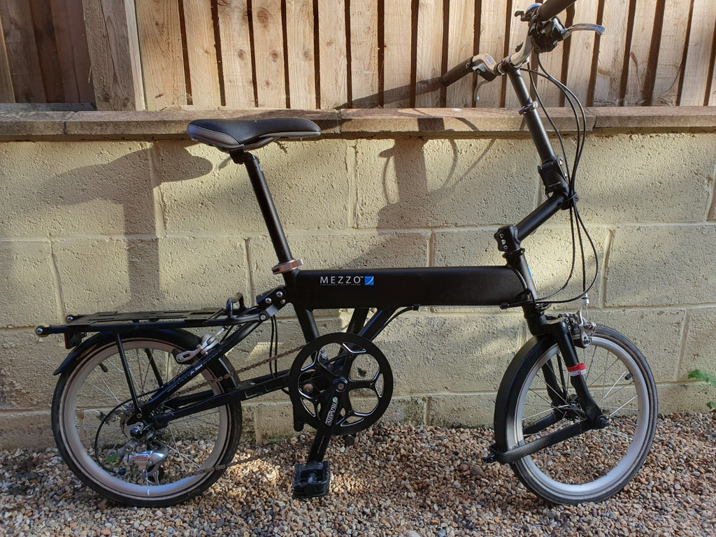Mezzo D9  9-speed folding bicycle, black, very good condition, with carry bag.