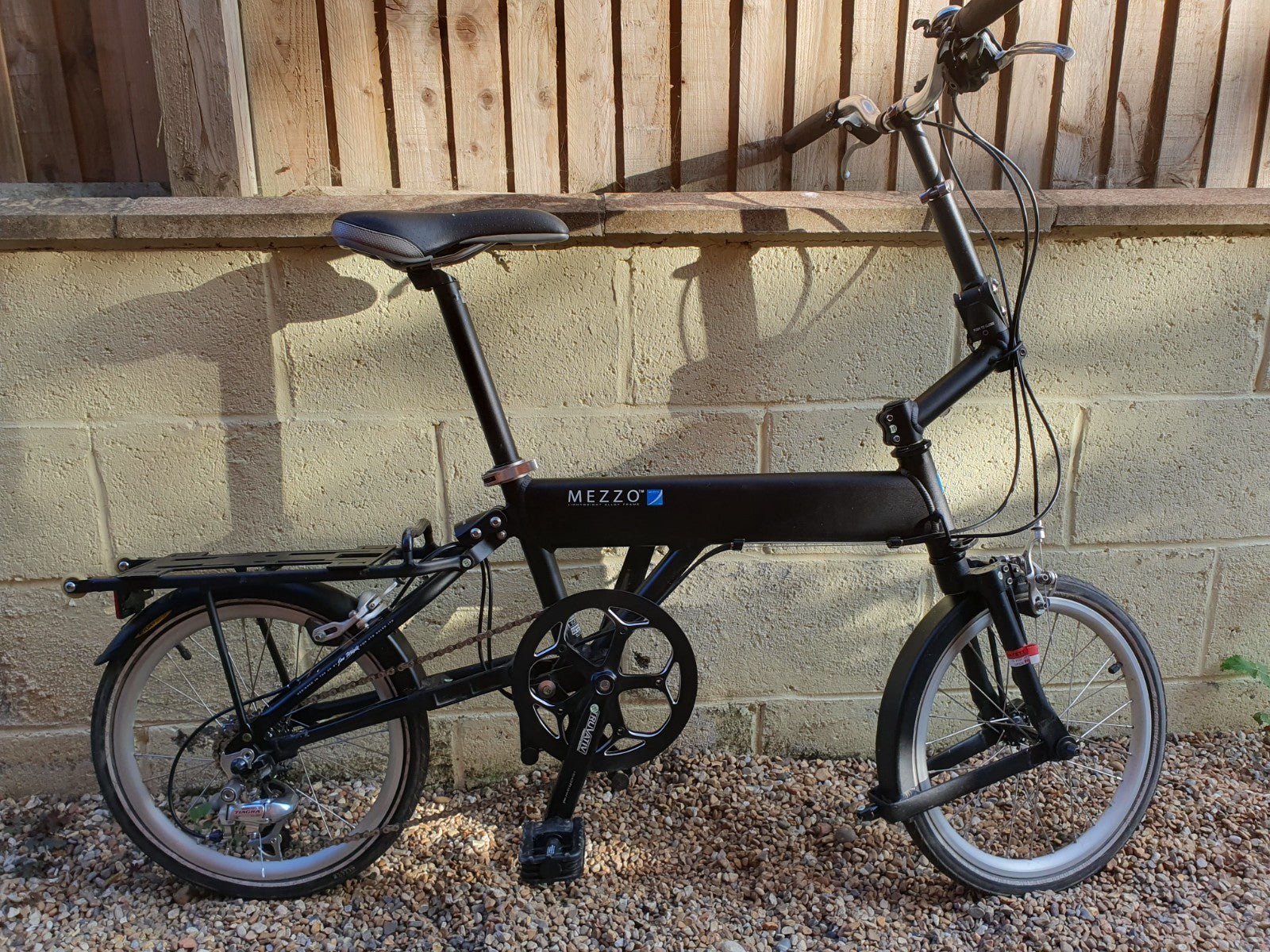 Mezzo D9  9-speed folding bicycle, black, very good condition, with carry bag.