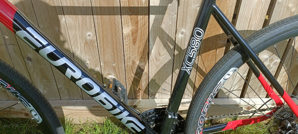 EuroBike XC580 Gravel Bike, with indoor resistance trainer kit