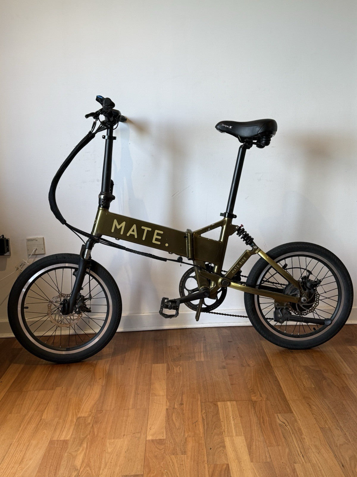 Olive Gold 250W MATE City Bike with 60mile Range, Discs & Full Suspension
