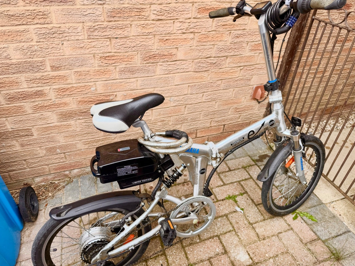 Two used foldable, pedal bikes with Shimano gears and front/back suspension