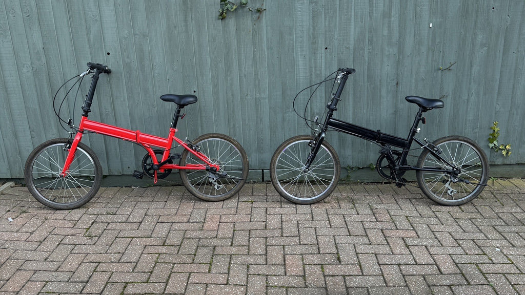 2 Folding Bikes, 1 Red and 1 Black, price is for both, 5 gears.