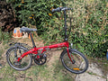 2025 Dahon Vybe (RED) 20in Folding Bike 7 Speed V-Brakes Rear Rack Mudguards