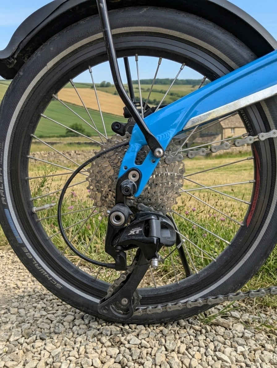 Birdy by Riese & Muller 18in, Cyan Blue  Hydraulic Disc, Front Susp, Lighting