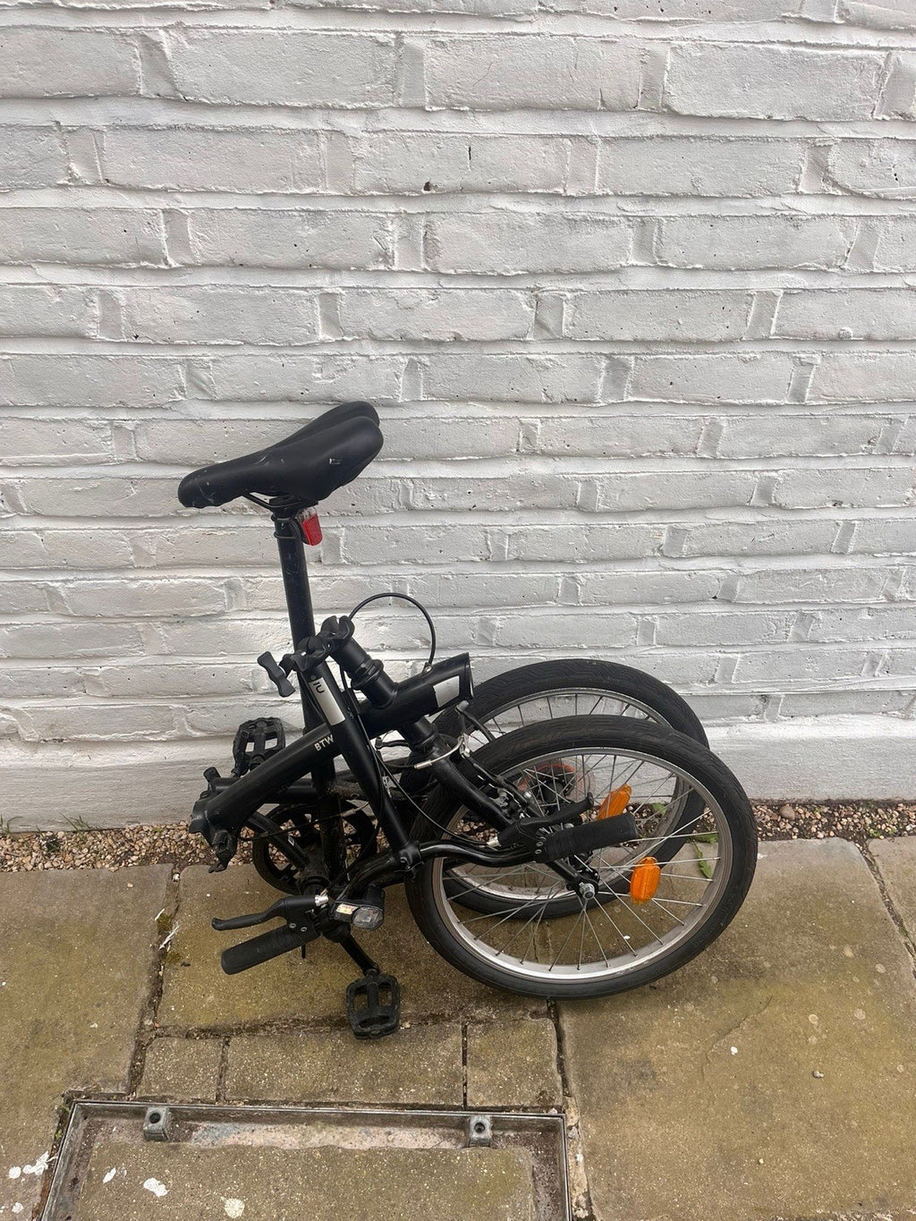 Black BTWIN folding bike