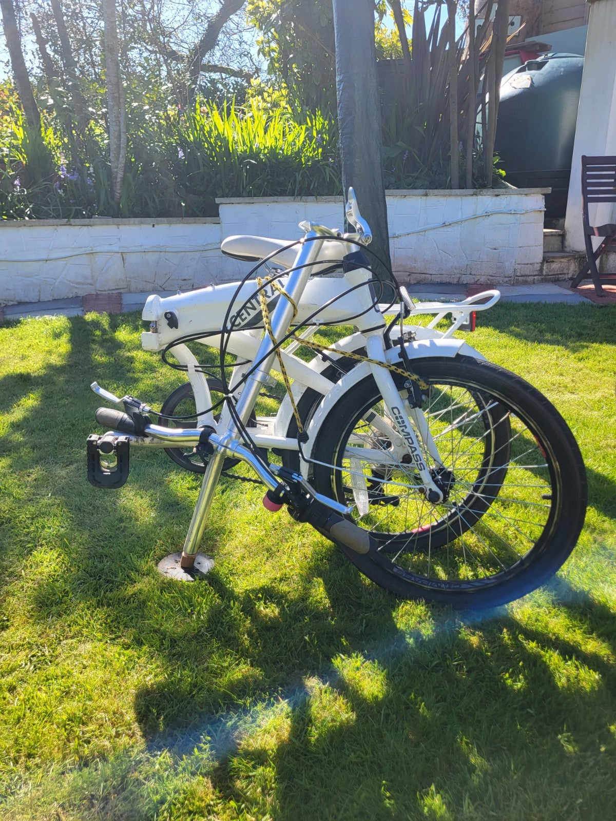 Compass Central  20in Folding Bicycles X  2, one white, one black.