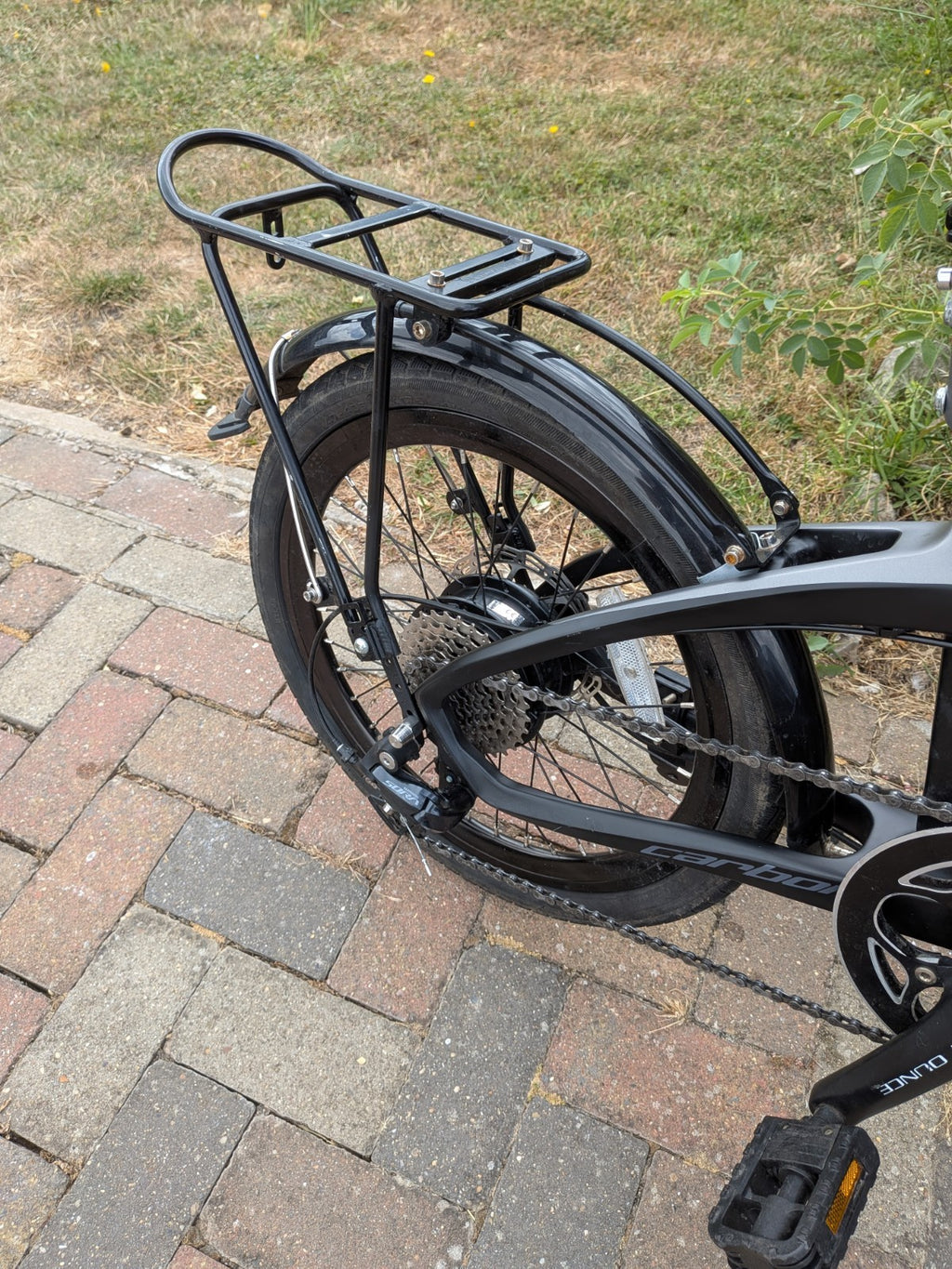 FURO Systems Folding Bike 20in 9-Speed Hydraulic Disc Brakes Rack Grey/Black