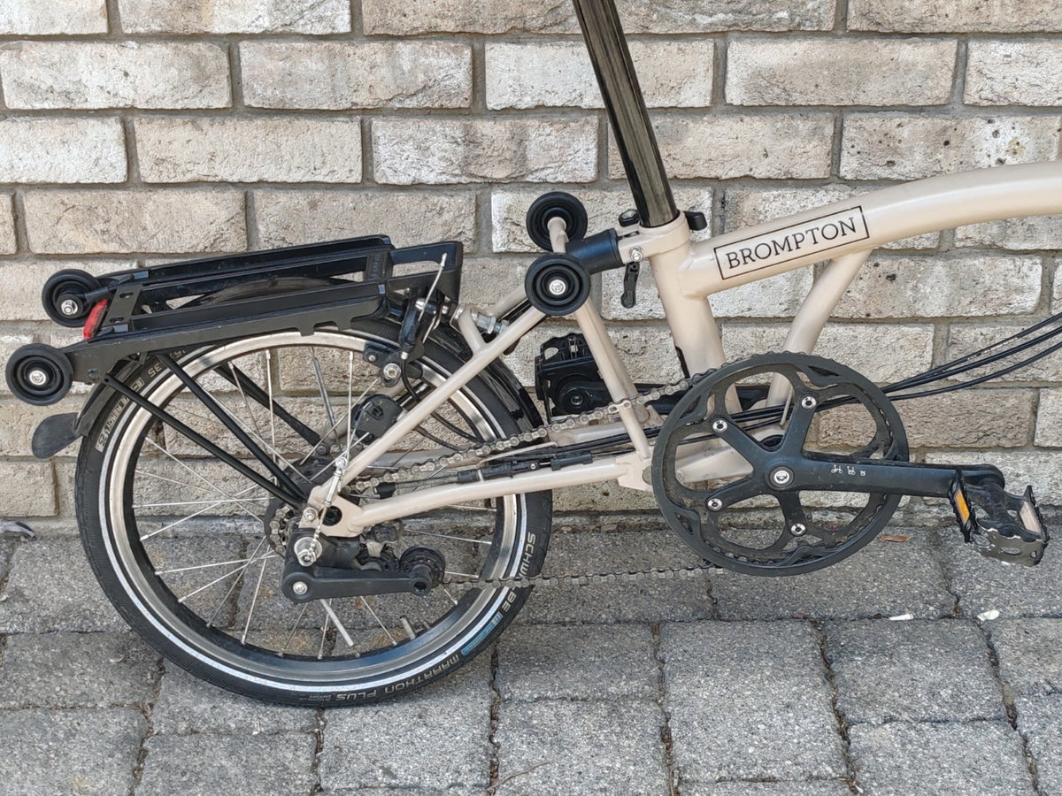 Brompton M6R 6 Speed Folding Bike – Dune Sand – Rear Rack – BikeRegister