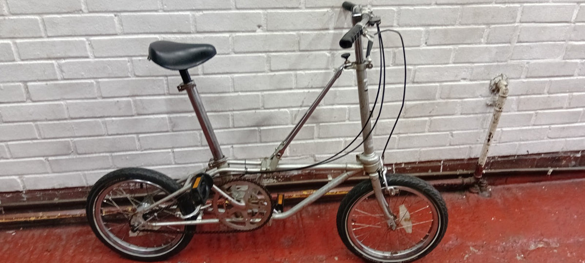 Silver Steel Folding Bike 20 in Wheels 1 Speed Riser Bars Rim Brake 24 cm