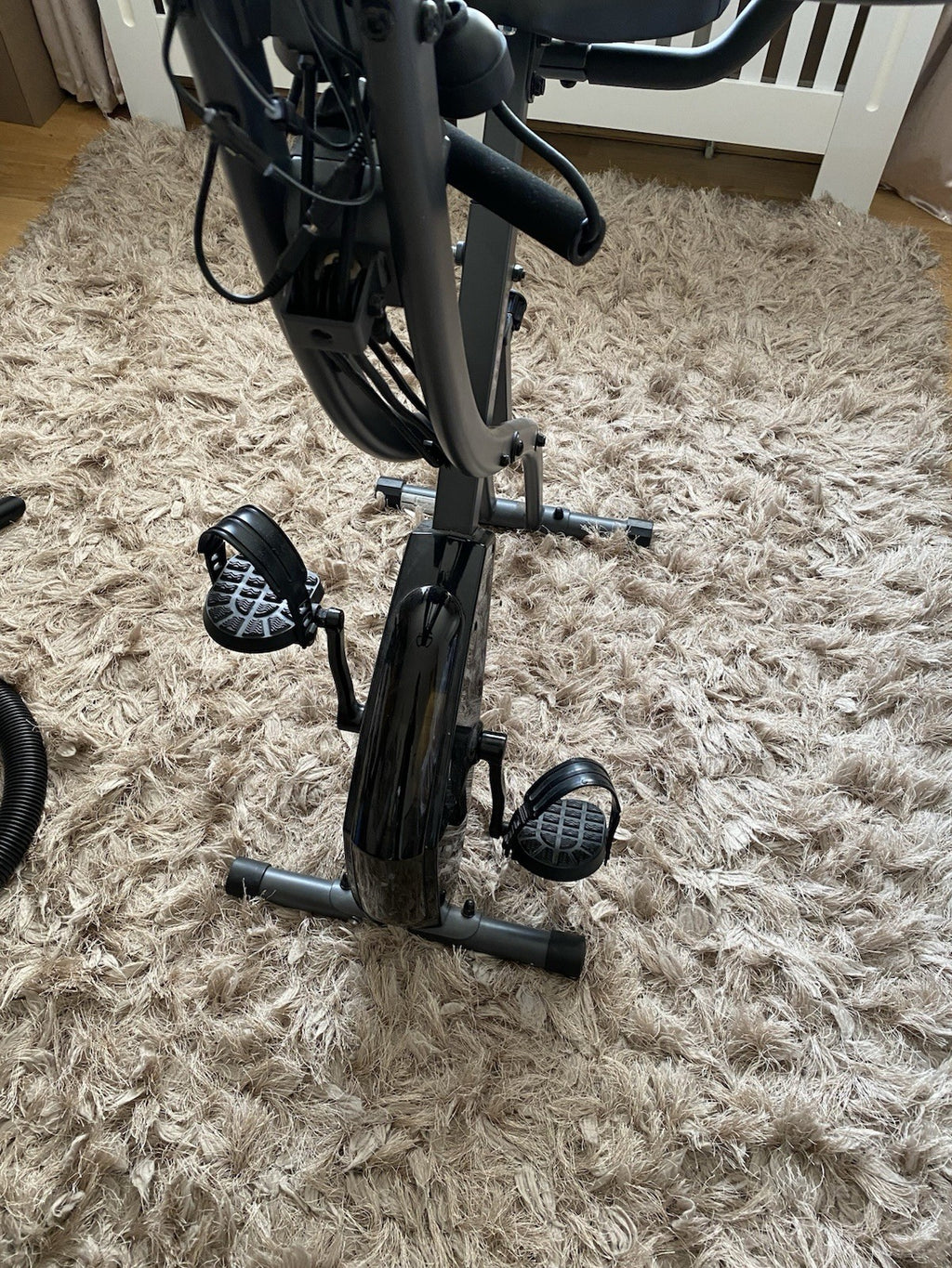 Slim Cycle foldable exercise bike worth over £200. Compact and sturdy