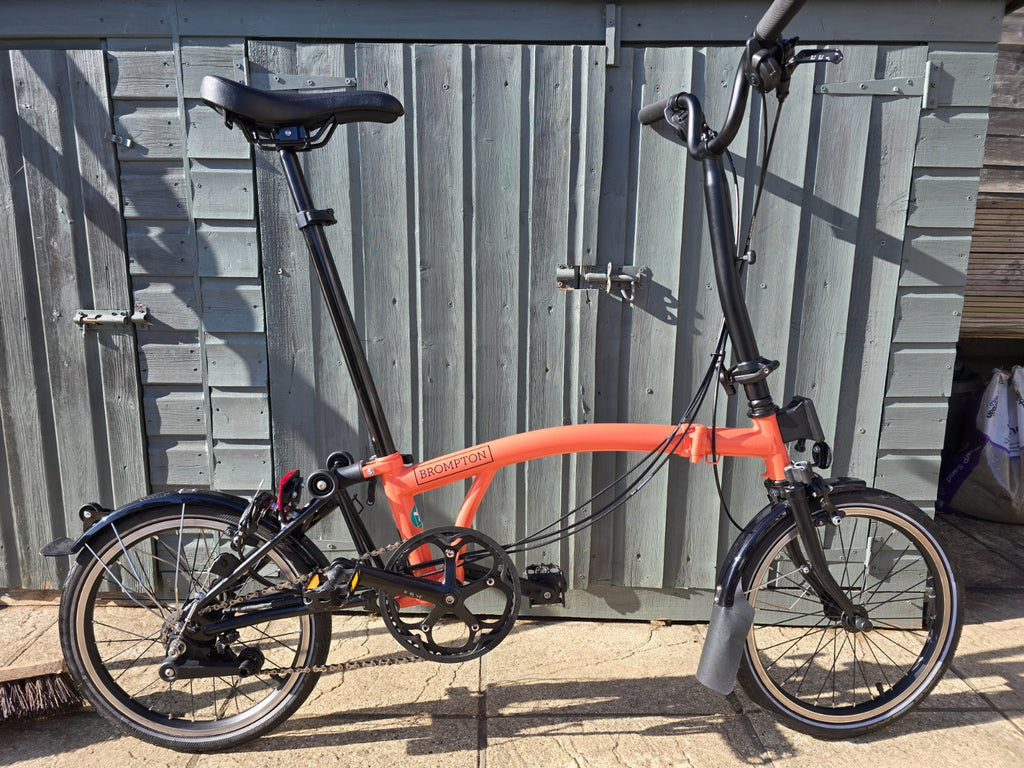 Brompton folding bike, 6 speed, C Line, registered Sept 23, orange