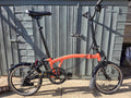 Brompton folding bike, 6 speed, C Line, registered Sept 23, orange