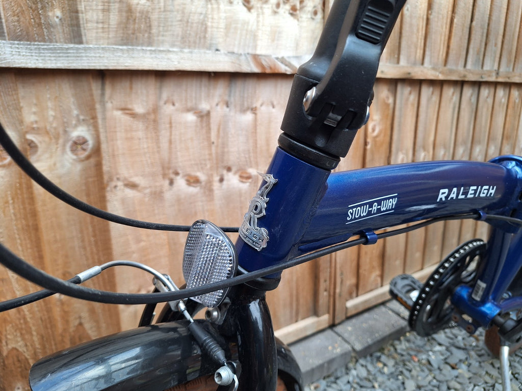 Raleigh Stowaway Folding Bike Blue, Shimano 7-Speed Unisex