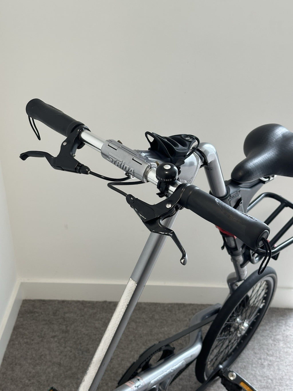 STRIDA SX Folding Bike – Silver Brush with Black Details – Good Condition