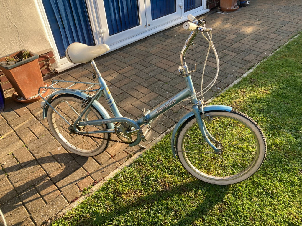 The Vintage Retro 1970s Hercules Compact folding bikes in blue